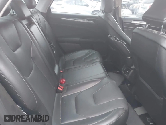 2016 Ford Fusion Titanium with VIN 3FA6P0K97GR118922, listed as a IAAI auction lot 42121212 with 256,584 mi miles and . Bid and sale history available at DreamBid. Image 8.
