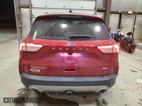 2020 Ford Escape Titanium with VIN 1FMCU9J97LUA00654, listed as a Copart auction lot 83695954 with 44,974 mi miles and Salvage title. Bid and sale history available at DreamBid. Image 6.