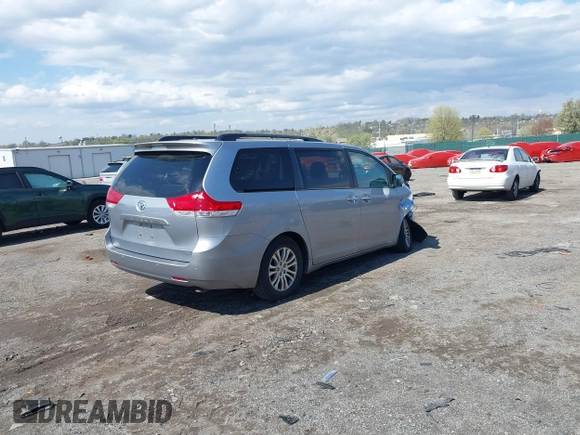 2013 Toyota Sienna XLE AAS with VIN 5TDYK3DC5DS375095, listed as a IAAI auction lot 42042334 with 130,633 mi miles. Bid and sale history available at carsss.com. Image 4.