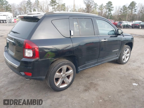 2014 Jeep Compass Limited with VIN 1C4NJDCB9ED549543, listed as a IAAI auction lot 41938699 with 195,973 mi miles. Bid and sale history available at carsss.com. Image 4.