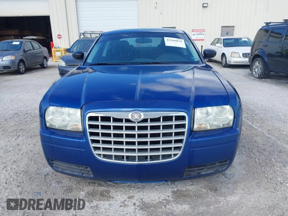 2009 Chrysler 300 LX with VIN 2C3KA43D69H614978, listed as a IAAI auction lot 41966879 with 247,871 mi miles. Bid and sale history available at carsss.com. Image 6.