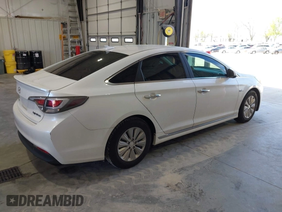 2016 Hyundai Sonata Hybrid SE with VIN KMHE24L15GA009241, listed as a IAAI auction lot 42083395 with 127,068 mi miles. Bid and sale history available at carsss.com. Image 4.