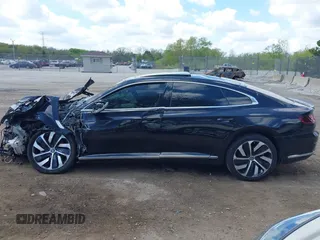 2021 Volkswagen Arteon SEL R-Line с VIN WVWSR7AN1ME005265, выставлен на аукционе IAAI как лот 42274686 с пробегом Не указан миль и . История ставок и продаж доступна на DreamBid. Изображение 13.