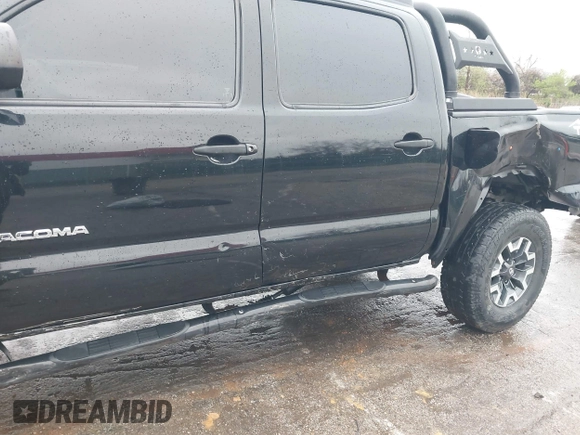 2015 Toyota Tacoma with VIN 3TMLU4ENXFM185371, listed as a IAAI auction lot 41952513 with 87,128 mi miles and . Bid and sale history available at DreamBid. Image 18.