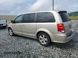 2013 Dodge Grand Caravan SE with VIN 2C4RDGBG2DR791593, listed as a Copart auction lot 51997165 with 84,959 mi miles and Salvage Title. Bid and sale history available at DreamBid. Image 2.