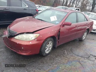 2005 Toyota Camry LE with VIN 4T1BF32K35U094619, listed as a IAAI auction lot 41340935 with 268,736 mi miles and . Bid and sale history available at DreamBid. Image 2.