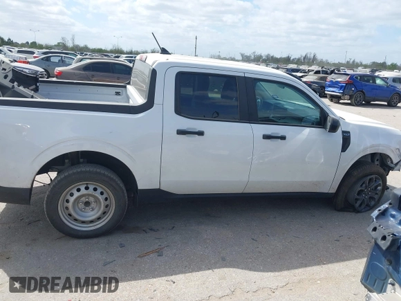 2023 Ford Maverick XL with VIN 3FTTW8E96PRA74020, listed as a IAAI auction lot 41782011 with 30,592 mi miles and . Bid and sale history available at DreamBid. Image 14.