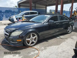 2014 Mercedes-Benz CLS 550 with VIN WDDLJ7DB4EA124973, listed as a Copart auction lot 60660305 with 138,890 mi miles and Salvage title. Bid and sale history available at DreamBid. Image 1.