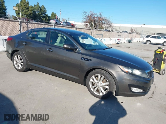 2013 Kia Optima LX with VIN 5XXGM4A74DG114626, listed as a IAAI auction lot 41349903 with 126,856 mi miles. Bid and sale history available at carsss.com. Image 1.