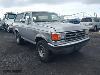 1987 Ford Bronco Custom with VIN 1FMEU15H4HLA38822, listed as a IAAI auction lot 41980537 with 81,328 mi miles. Bid and sale history available at carsss.com. Image 6.