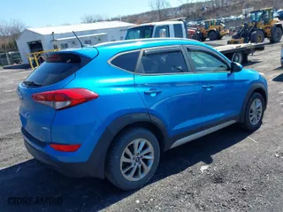 2017 Hyundai Tucson SE Plus with VIN KM8J3CA4XHU315340, listed as a IAAI auction lot 41857937 with 83,957 mi miles. Bid and sale history available at carsss.com. Image 4.