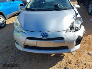 2012 Toyota Prius c One with VIN JTDKDTB35C1011662, listed as a IAAI auction lot 41424171 with 200,013 mi miles. Bid and sale history available at carsss.com. Image 12.