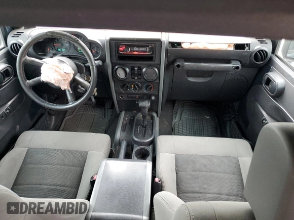 2008 Jeep Wrangler Unlimited X with VIN 1J4GB39138L602949, listed as a Copart auction lot 78503934 with 181,023 mi miles and Salvage Title. Bid and sale history available at DreamBid. Image 8.