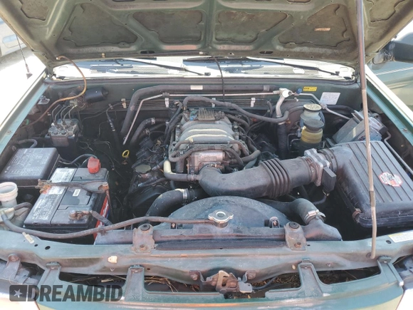 2002 Isuzu Rodeo S z VIN 4S2CK58W024333487, wystawiony jako Copart lot #76361854 z przebiegiem Nie podano mil oraz Nie do naprawy • Non repairable. Historia ofert i sprzedaży dostępna na DreamBid. Obrazek 12.