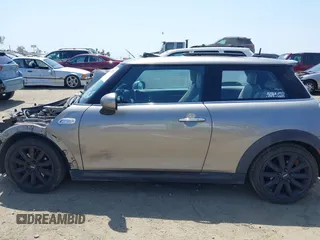 2017 MINI Hardtop Cooper S with VIN WMWXP7C34H2C61768, listed as a IAAI auction lot 42579522 with 67,876 mi miles and . Bid and sale history available at DreamBid. Image 15.