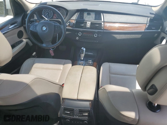 2012 BMW X5 35i z VIN 5UXZV4C54CL990840, wystawiony jako Copart lot #57715245 z przebiegiem 166 192 mil mil oraz Szkoda całkowita • Salvage title. Historia ofert i sprzedaży dostępna na DreamBid. Obrazek 8.