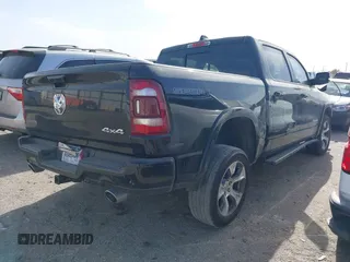 2021 Ram 1500 Laramie z VIN 1C6SRFJT4MN799792, wystawiony jako IAAI lot #41838329 z przebiegiem 106 968 mil mil oraz . Historia ofert i sprzedaży dostępna na DreamBid. Obrazek 4.
