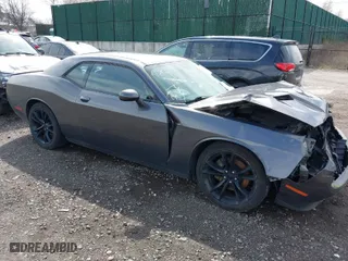 2016 Dodge Challenger SXT Plus with VIN 2C3CDZAG5GH323195, listed as a IAAI auction lot 42019175 with 79,968 mi miles. Bid and sale history available at carsss.com. Image 1.