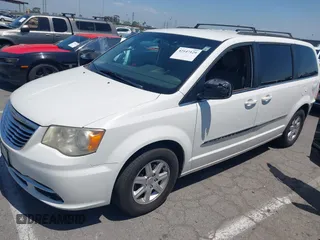 2012 Chrysler Town & Country Touring with VIN 2C4RC1BG5CR291815, listed as a IAAI auction lot 42147129 with 167,982 mi miles and . Bid and sale history available at DreamBid. Image 2.