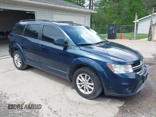 2014 Dodge Journey SXT z VIN 3C4PDCBG6ET296585, wystawiony jako IAAI lot #42169987 z przebiegiem 150 539 mil mil oraz . Historia ofert i sprzedaży dostępna na DreamBid. Obrazek 1.