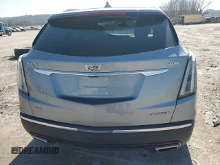 2023 Cadillac XT5 AWD Sport with VIN 1GYKNGRS7PZ133622, listed as a Copart auction lot 48342095 with 63,008 mi miles and Salvage title. Bid and sale history available at DreamBid. Image 6.