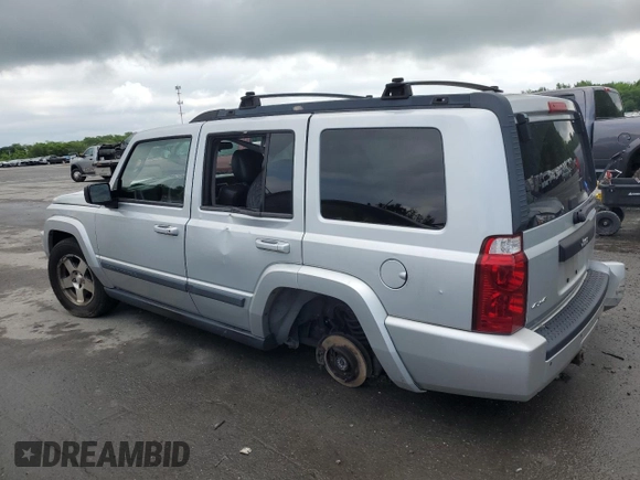 2009 Jeep Commander Sport z VIN 1J8HG48K29C531877, wystawiony jako Copart lot #58708825 z przebiegiem 198 585 mil mil oraz Szkoda całkowita • Salvage title. Historia ofert i sprzedaży dostępna na DreamBid. Obrazek 2.