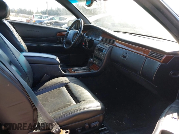 1998 Cadillac Eldorado Touring with VIN 1G6ET1295WU610253, listed as a IAAI auction lot 42066181 with 85,172 mi miles and . Bid and sale history available at DreamBid. Image 5.
