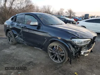 2019 BMW X4 M40i z VIN 5UXUJ5C5XKLA93583, wystawiony jako Copart lot #84643664 z przebiegiem Nie podano mil oraz Szkoda całkowita • Salvage title. Historia ofert i sprzedaży dostępna na DreamBid. Obrazek 4.
