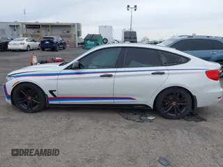 2016 BMW 3 Series GT 328i xDrive with VIN WBA8Z5C52GG502293, listed as a IAAI auction lot 42007325 with 64,659 mi miles. Bid and sale history available at carsss.com. Image 14.