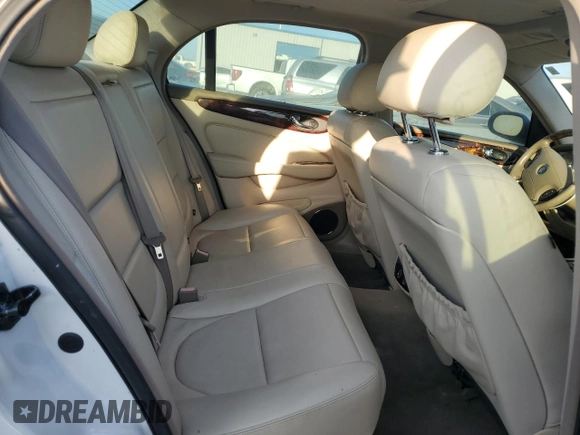 2004 Jaguar XJ with VIN SAJWA71CX4SG21334, listed as a Copart auction lot 70946034 with 0 mi miles and Clean Title. Bid and sale history available at carsss.com. Image 10.