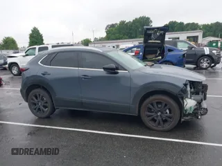2023 Mazda CX-30 S Carbon Edition with VIN 3MVDMBCM9PM574358, listed as a IAAI auction lot 42105931 with 55,975 mi miles and . Bid and sale history available at DreamBid. Image 14.