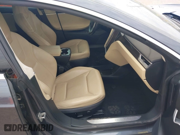2016 Tesla Model S 90D with VIN 5YJSA1E27GF129130, listed as a IAAI auction lot 41922227 with 134,422 mi miles and . Bid and sale history available at DreamBid. Image 5.