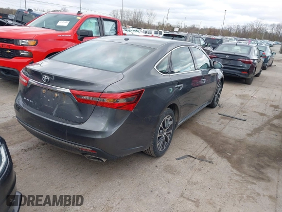 2018 Toyota Avalon XLE with VIN 4T1BK1EB9JU275097, listed as a IAAI auction lot 41940585 with 119,854 mi miles and . Bid and sale history available at DreamBid. Image 4.