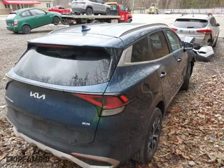 2023 Kia Sportage Hybrid EX with VIN KNDPVCAG3P7057632, listed as a IAAI auction lot 41816555 with 27,849 mi miles. Bid and sale history available at carsss.com. Image 4.