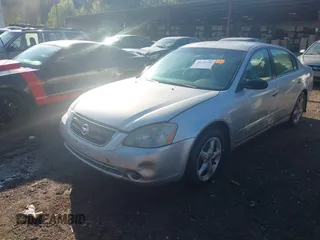 2004 Nissan Altima S with VIN 1N4AL11D34C140198, listed as a IAAI auction lot 41821256 with 182,905 mi miles. Bid and sale history available at carsss.com. Image 2.