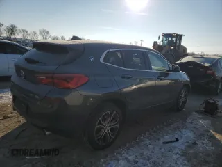 2020 BMW X2 xDrive28i with VIN WBXYJ1C00L5P51384, listed as a Copart auction lot 87406814 with 52,807 mi miles and Salvage Title. Bid and sale history available at carsss.com. Image 3.