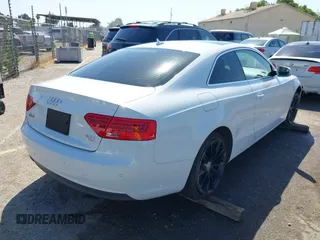 2014 Audi A5 Premium Plus with VIN WAULFAFR0EA039337, listed as a IAAI auction lot 42370262 with 106,097 mi miles and . Bid and sale history available at DreamBid. Image 4.