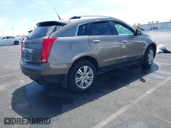 2012 Cadillac SRX Luxury Collection with VIN 3GYFNAE30CS612453, listed as a IAAI auction lot 42048235 with 173,982 mi miles and . Bid and sale history available at carsss.com. Image 4.
