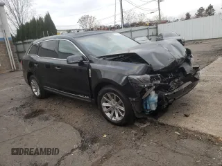 2019 Lincoln MKT with VIN 2LMHJ5NK3KBL04254, listed as a Copart auction lot 77127214 with Not Provided miles and Salvage Title. Bid and sale history available at DreamBid. Image 4.