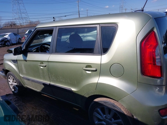 2012 Kia Soul + with VIN KNDJT2A65C7403543, listed as a IAAI auction lot 41633273 with 128,988 mi miles. Bid and sale history available at carsss.com. Image 14.