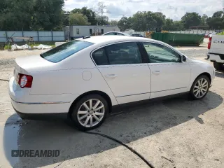 2006 Volkswagen Passat z VIN WVWFU93CX6P163702, wystawiony jako Copart lot #67068174 z przebiegiem 199 479 mil mil oraz Szkody całkowita. Historia ofert i sprzedaży dostępna na DreamBid. Obrazek 3.