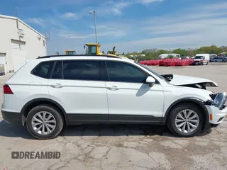 2019 Volkswagen Tiguan S with VIN 3VV0B7AX0KM027036, listed as a IAAI auction lot 42202681 with 75,192 mi miles and . Bid and sale history available at DreamBid. Image 14.