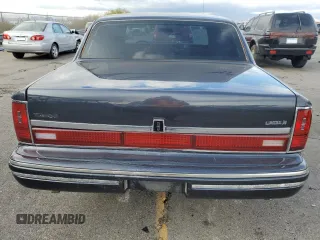 1994 Lincoln Town Car Signature z VIN 1LNLM82W6RY705395, wystawiony jako Copart lot #82490554 z przebiegiem 252 997 mil mil oraz Szkoda całkowita • Salvage title. Historia ofert i sprzedaży dostępna na DreamBid. Obrazek 6.