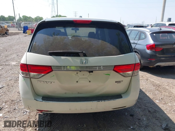 2014 Honda Odyssey EX-L with VIN 5FNRL5H63EB131596, listed as a IAAI auction lot 42402427 with 106,156 mi miles and . Bid and sale history available at DreamBid. Image 16.