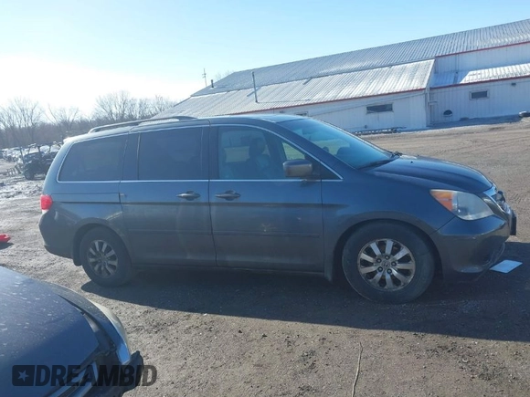 2010 Honda Odyssey EX-L with VIN 5FNRL3H68AB038541, listed as a IAAI auction lot 41813473 with 206,914 mi miles. Bid and sale history available at carsss.com. Image 1.