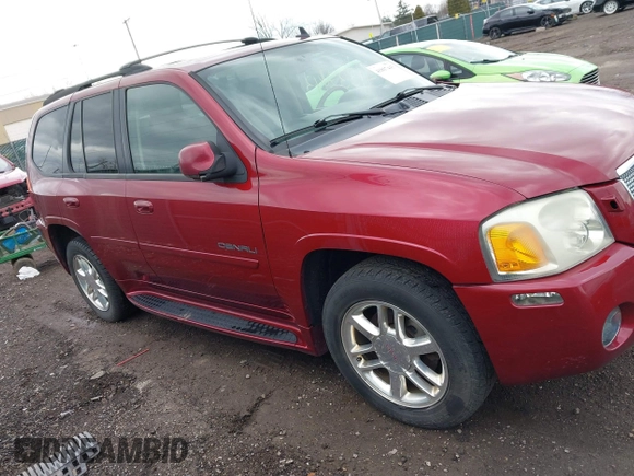 2006 GMC Envoy Denali with VIN 1GKET63M762119339, listed as a IAAI auction lot 41837443 with 192,458 mi miles. Bid and sale history available at carsss.com. Image 13.