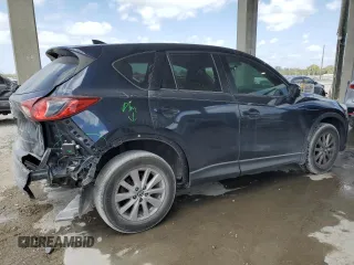 2016 Mazda CX-5 Touring with VIN JM3KE2CY9G0834048, listed as a Copart auction lot 54491535 with 116,328 mi miles and Salvage Title. Bid and sale history available at DreamBid. Image 3.