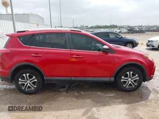 2016 Toyota RAV4 LE with VIN 2T3ZFREV4GW252399, listed as a IAAI auction lot 41955913 with 159,830 mi miles and . Bid and sale history available at carsss.com. Image 13.