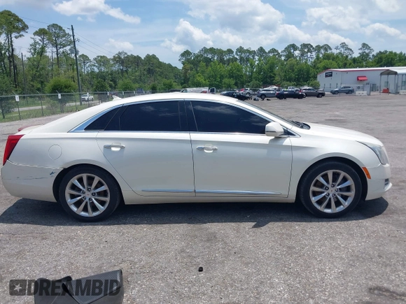 2013 Cadillac XTS Luxury with VIN 2G61P5S38D9160016, listed as a IAAI auction lot 42192602 with 134,879 mi miles and . Bid and sale history available at DreamBid. Image 13.