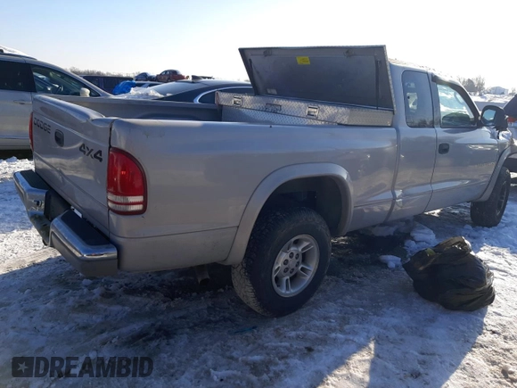 1999 Dodge Dakota SLT with VIN 1B7GG22X1XS282681, listed as a Copart auction lot 88292595 with Not Provided miles and Salvage Title. Bid and sale history available at carsss.com. Image 3.